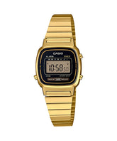 Gold Casio digital watch on a white background